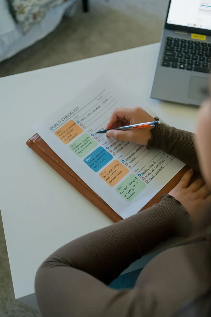 A calendar being marked while planning at home.